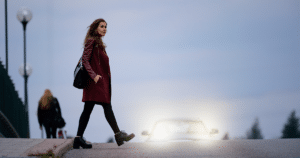 Pedestrian jaywalking in front of a car in South Carolina