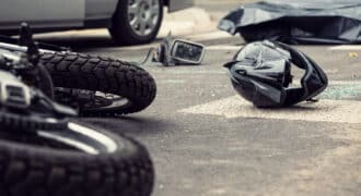 motorcycle helmet on the road after a car crash