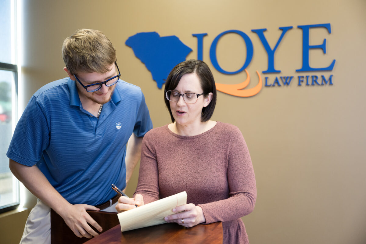 Receptionist helping someone