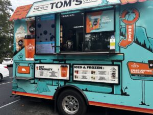 Joye Law Firm celebrates National Coffee Day with Tom's Travelin' Coffee